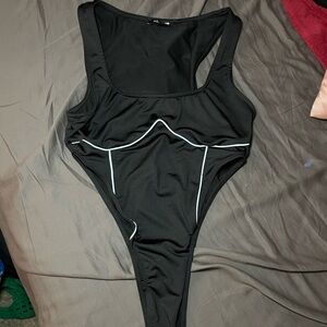 Black fashionnova bodysuit with silver reflective design